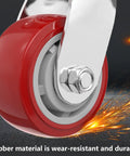 Heavy Duty Industrial Casters Set Of Four Swivel Rubber Wheels With One Touch Brakes Silent Rolling Design For Workshop Carts And Mobile Toolboxes Built Tough To Roll Smooth And Crush Any Heavy Load Today close-up of a durable red rubber caster wheel with a metallic swivel hub.