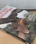 Book cover of Training Birds Of Prey Made Simple Down To Earth Practical Guide For Working With Hawks Falcons Eagles Owls And Buzzards.
