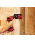 Craftsman Bi-Metal Door Lock Installation Kit mounted on a wooden door frame with a red cordless drill in use