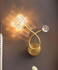Modern Copper And Clear Crystal Glass Wall Sconces Featuring Slick Up And Down Lighting For Bathroom Vanity And Living Room Decor With Heavy Duty Build And Chill Ambient Vibes Two Pack, gold finish, wall mounted, soft glow.