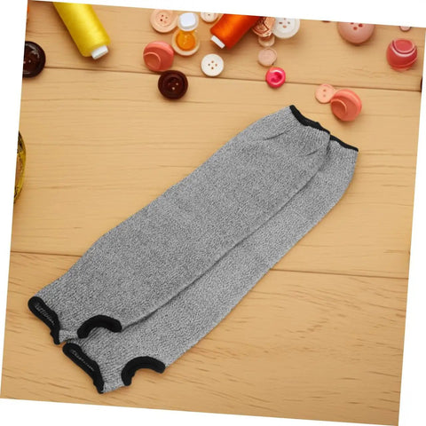 Tough As Nails Cut Resistant Arm Sleeves With Thumb Hole Grip, breathable grey mesh work guards on wooden surface.