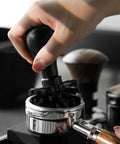 Pro-Grade Espresso Portafilter Brush For 51mm, 54mm, And 58mm Baskets, ABS Handle, Barista Ready Cleaning Tool, Arc Cross Bristles For Quick No-Muss Portafilter Cleanup And Residue Removal shown in use