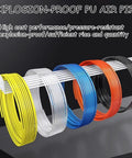 Rock Solid Pu Polyurethane Pneumatic Tubing And Air Compressor Hose With Slick Flex Design Wear Resistant Build For Tight Shop Jobs Grease Monkey Approved Heavy Duty Air Lines in yellow, white, blue, orange, and black colors.