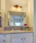 Bathroom mirror with Two Light Gold Vanity Lighting Fixture With Globe Seeded Glass Shades For Bathroom Slick Modern Dark Gold Finish