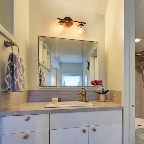 Bathroom mirror with Two Light Gold Vanity Lighting Fixture With Globe Seeded Glass Shades For Bathroom Slick Modern Dark Gold Finish