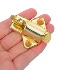 Hand holding a Spring Loaded Zinc Alloy Cabinet Lock With Self Locking Bolt No Hassle Install For Doors And Cabinets Automatic Spring