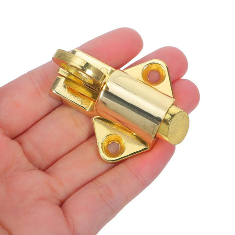 Hand holding a Spring Loaded Zinc Alloy Cabinet Lock With Self Locking Bolt No Hassle Install For Doors And Cabinets Automatic Spring