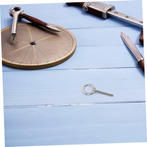 Stainless Steel Extended Eye Bolt M10x60 With Ring Hardware Kit For Heavy Duty Lifting And Outdoor Use Includes Flat Washer, Spring Washer, And Nut Reliable Corrosion Resistant Ring Eye Screw shown on blue wood