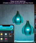 Smart Home Starter Kit With Bridge Pro And Four A19 And E26 Smart Bulbs in blue pendant lights, smart app displayed on phone.