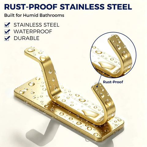 Ditch the Drill with These Heavy Duty Adhesive Towel Hooks for Bathroom 4 Pack Stainless Steel Wall Mounts that Hold Heavy Loads Super Easy Peel Stick Hangers for Shower Gear and Keys, close-up of rust-proof gold hook with water droplets.