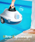 Cordless Robotic Pool Cleaner With Beast Suction And 120 Minute Runtime Automatic Vacuum For Above Ground And Inground Pools Up To 65 Feet Or 1100 Sq Ft Self Parking Lightweight Design In Ivory being lifted by poolside.