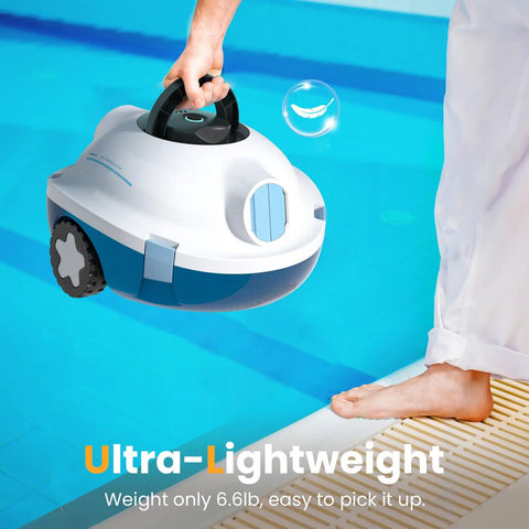 Cordless Robotic Pool Cleaner With Beast Suction And 120 Minute Runtime Automatic Vacuum For Above Ground And Inground Pools Up To 65 Feet Or 1100 Sq Ft Self Parking Lightweight Design In Ivory being lifted by poolside.