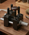 Ultimate Compact Handheld Metal Vise With Knurled Knob For Tight Clamping And Precision Work On Delicate Mini Projects on a workbench.