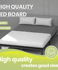 Queen Size Bunkie Board With Firm Anti Sag Under Bed Support Pad Flat Out Rock Solid Platform To Halt Mattress Sag Bridge Slat Gaps And Guarantee Dream Sleep on a bed with gray sheets.