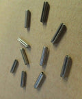Scattered One Eighth Inch By Nine Sixteenths Inch Grade 420 Stainless Steel Slotted Tension Roll Pins Pack Of 25