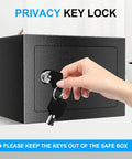 Compact 1.8 Cubic Fireproof Safe For Home Use With Digital Keypad And Waterproof Design shown with key inserted.