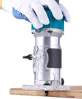 Rock Solid Electric Wood Router And Smooth Operator Trimmer featuring a soft cushion grip, used on a wooden surface.