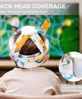Child wearing dinosaur-patterned breathable baby helmet for crawling and walking, lightweight head protector for safe play.