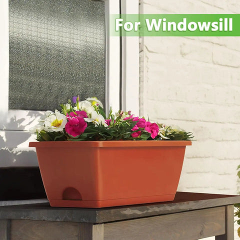Kick It Up A Notch On Your Deck With These Sturdy Railing Planter Boxes Perfect For Balconies Patios And Windowsills Quick Setup Metal Brackets Included Deep Root Zone For Lush Greenery Classic Red Finish. Red planter box on a windowsill filled with colorful flowers.
