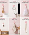 Super Sweet Pink Heart Wall Hooks 10 Pack Adhesive Hangars For Heavy Keys Towels Jackets And Bags Freakin Cute Decorative Storage Organizer For Bathroom Bedroom Or Entryway That Totally Slays Everyday Life, showing hooks in various uses.