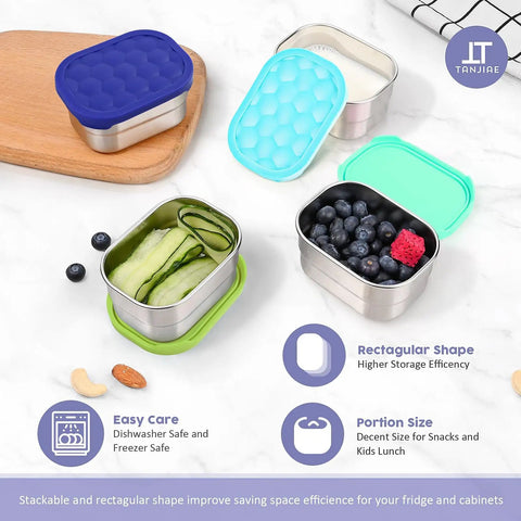 4-Pack 8oz stainless steel snack containers with leak-proof silicone lids, filled with cucumber and berries, on a countertop.