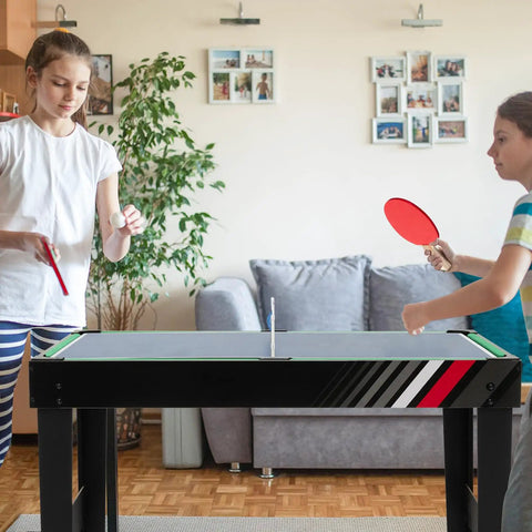 49 Inch 4 In 1 Combo Game Table Featuring Fast Swap Foosball Slide Hockey Ping Pong And Pool Tops Built For Adult Game Rooms Weekend Warrior Sessions And Chill Hangouts during a friendly ping pong match.