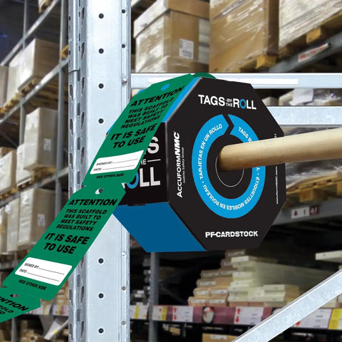 OSHA Compliant Scaffolding Tags By The Roll, Attention Sign To Keep Scaffolds Safe And On Point, Waterproof PF-Cardstock shown in warehouse.