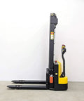 Heavy Duty Electric Thin Leg Pallet Stacker As A No Fuss Heavy Hitter With 2204 Lb Load Capacity And 130 Inch Lift Height featured in profile view.