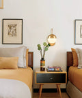 Mid Century Modern Wall Sconce With Switch Gold Brass Finish Easy Plug In Wall Light With Opal White Glass Globe in bedroom setting