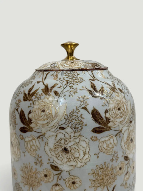 Floral patterned lid of Blue Enamel Copper Water Dispenser With Lid And Tap Handmade Indian Pot
