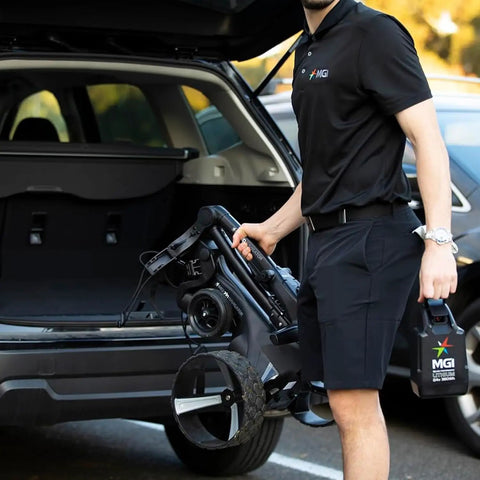 No Drama All Terrain Remote Electric Golf Cart With Full Zip Folding Frame, compact design, easy to carry, prepared for golf outing.
