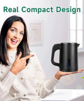 Woman holding Portable Stainless Steel Electric Kettle 0.8L Mini Hot Water Boiler For Travel, Black, real compact design.