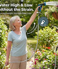 Person using Heavy Duty Metal Garden Hose With Stainless Steel Braided Construction, One Hundred Foot Length, watering plants