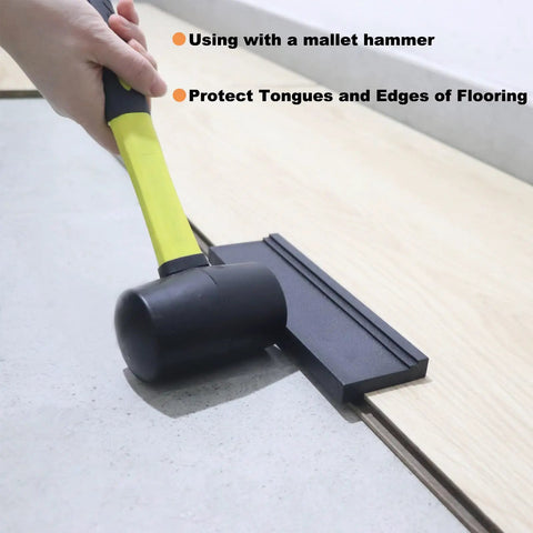 Universal Tapping Block For Vinyl Plank And Laminate Flooring With 3 Edges in use with a mallet on flooring