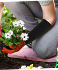 Person using Heavy Duty Thorn Protective Arm Sleeves Cut Resistant Guard For Farm Chores And Yard Work while planting flowers.