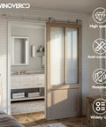 Top Mount Sliding Barn Door Hardware Kit Built Tough With Heavy Duty Stainless Steel Track And Slick Ball Bearing Rollers For Single Doors That Move Smooth As Butter Up To Forty One Inch Wide installed in a modern interior.