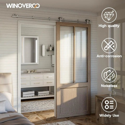 Top Mount Sliding Barn Door Hardware Kit Built Tough With Heavy Duty Stainless Steel Track And Slick Ball Bearing Rollers For Single Doors That Move Smooth As Butter Up To Forty One Inch Wide installed in a modern interior.