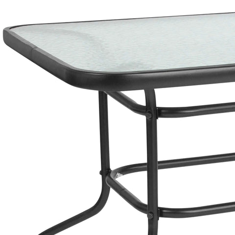 Corner view of Modern Rippled Glass Outdoor Dining Table with Umbrella Hole, Rectangular 31.5 Inch by 55 Inch, black metal frame.