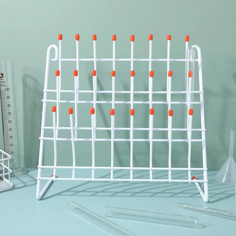 Solid 24 Position Lab Test Tube Drying Rack With Plastic Coated Metal For Science Experiments And Industrial Use Easy Drain Design Heavy Duty Bottle Holder For Chemists displayed on a desk.