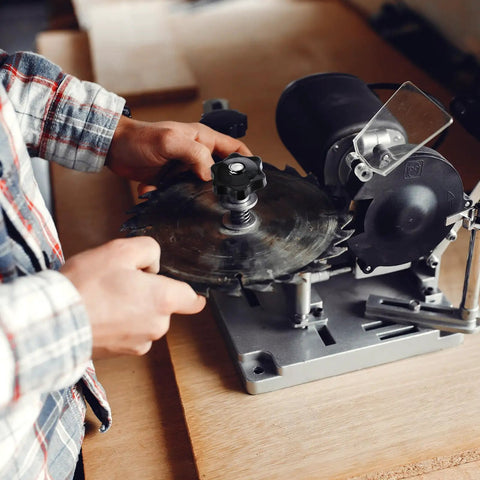 Four Pack M6 Six Star Knobs, Solid Black Nylon Screw On Through Threaded Clamps in use on a circular saw for easy adjustments.