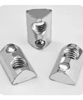 Close-up of 20 Pack Beefy Heavy Duty T Nut With Ball Spring For Aluminum Extrusion 5 16 18 Thread Zinc Plated Steel Roll In Silver
