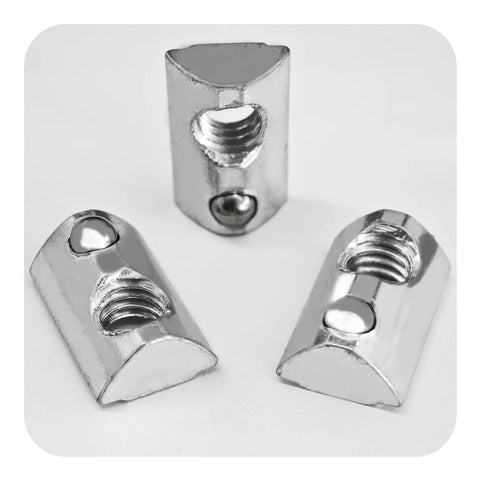 Close-up of 20 Pack Beefy Heavy Duty T Nut With Ball Spring For Aluminum Extrusion 5 16 18 Thread Zinc Plated Steel Roll In Silver