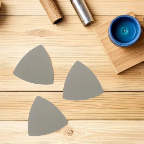 Top Rated Grit Triangular Silicon Carbide Sandpaper Sheets Waterproof Wet Dry Sanding Paper 8 Pack on wooden surface.
