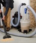 Total Game Changer DIY Cyclone Separator Kit For Wet And Dry Shop Vacs With Universal Adapter Set That Knocks Out Ninety Nine Percent Of Fine Sawdust Keeps Filters Fresh And Maintains Killer Suction All Day Long Clear View Window in use with shop vac and hose.