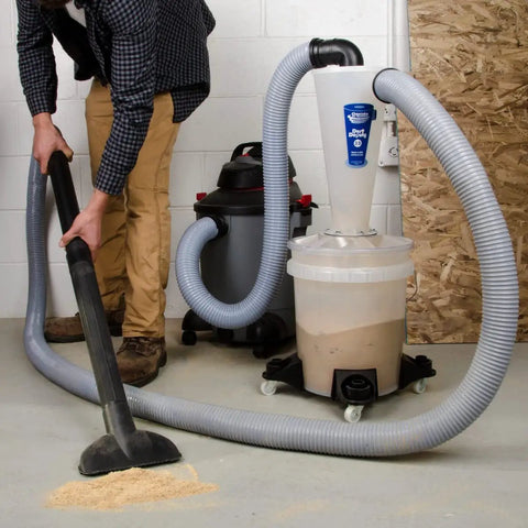 Total Game Changer DIY Cyclone Separator Kit For Wet And Dry Shop Vacs With Universal Adapter Set That Knocks Out Ninety Nine Percent Of Fine Sawdust Keeps Filters Fresh And Maintains Killer Suction All Day Long Clear View Window in use with shop vac and hose.