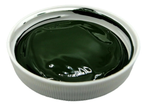 Olive drab epoxy pigment in a white jar, 1 oz for epoxy resin (close-up view)
