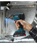 Person using Compact 18V One Quarter Inch Hex Impact Driver Bare Tool With Built In LED Light And Electronic Cell Protection in tight space