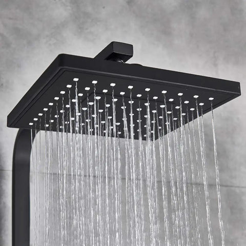 Close-up of UMJIGF Matte Black Shower System with Cold and Hot Water Shower Faucet Set multifunction shower head in action.