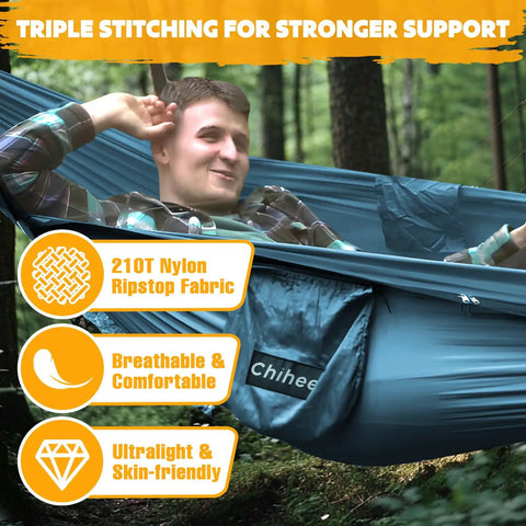 Man in Ultra Light Travel Hammock With Pop Up Net 660Lb Capacity Breathing Quick Dry Parachute Nylon in forest
