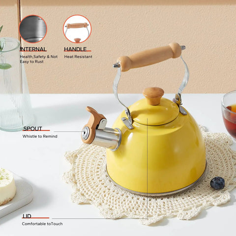 Yellow 1.6 Quart Tea Kettle With Cool Touch Wooden Handle Food Grade Stainless Steel Stovetop Teapot Whistling Kettle For Easy Pour Ergonomic Grip Safe Heat Resistant Kitchen Accessory shown on a table with drinks.
